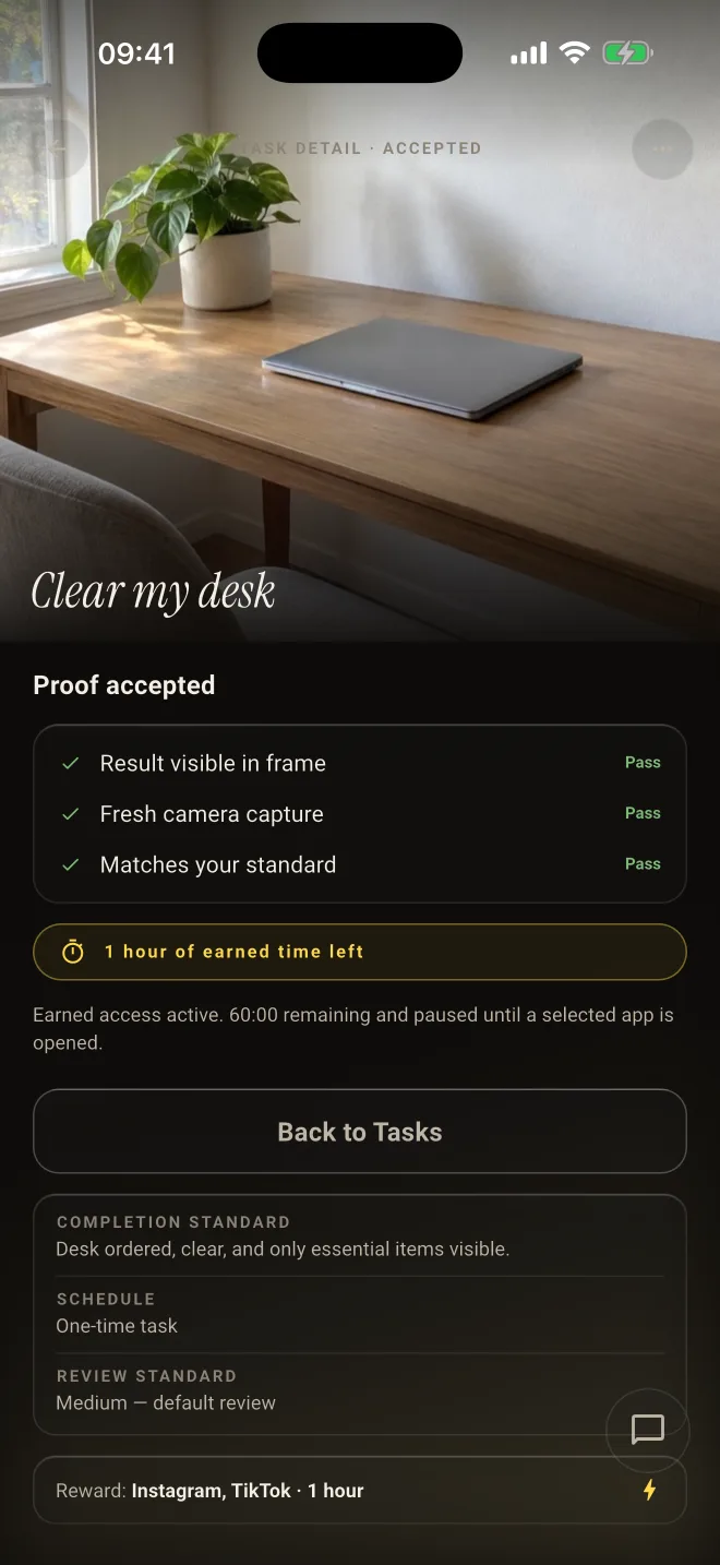 Pryvo screenshot: the task Clear my desk with proof accepted, three passing checks, and one hour of earned time for Instagram and TikTok